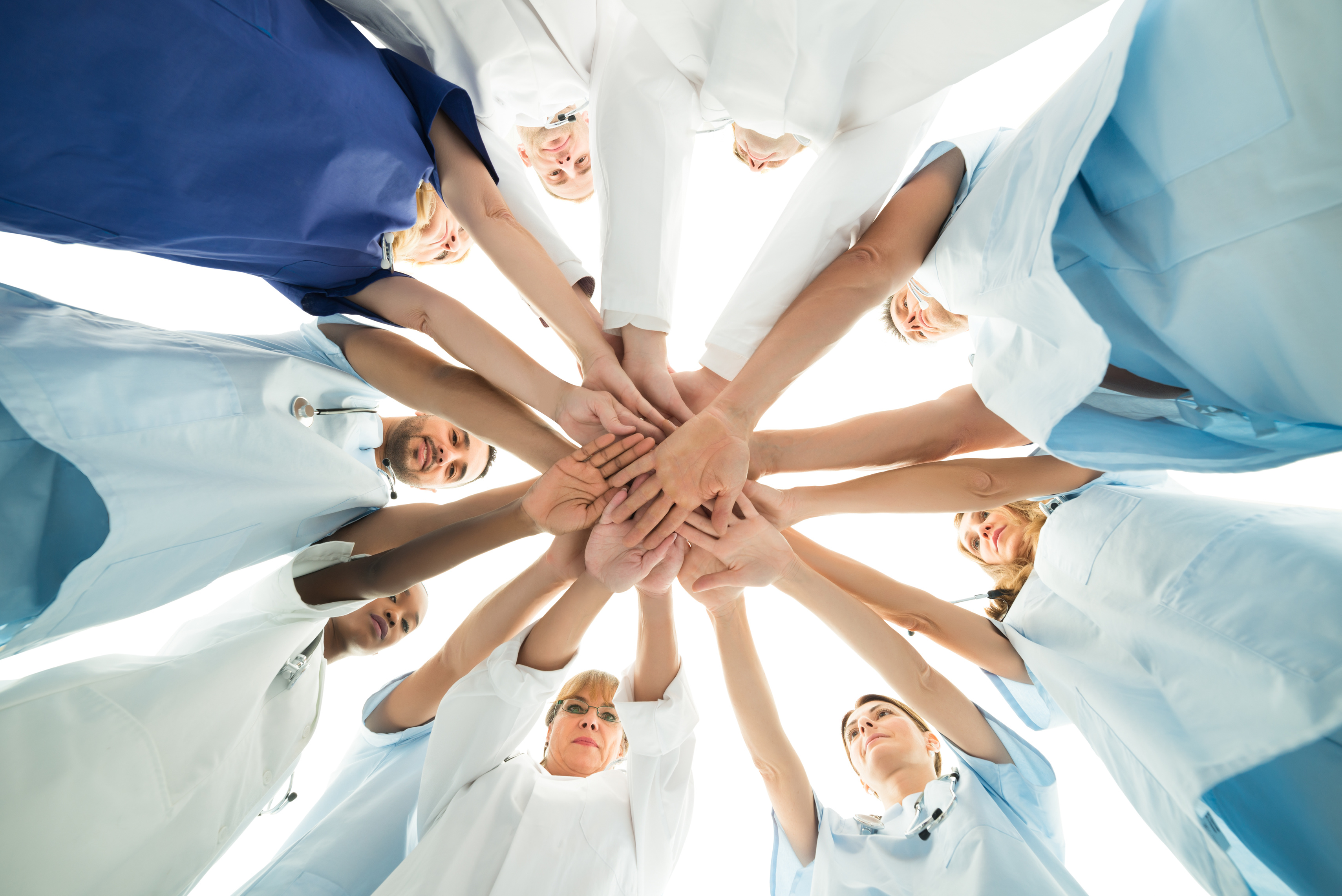 Multiethnic Medical Team Stacking Hands